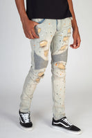 RIPPED MOTO JEANS WITH MULTI-PAINT SPLATTER