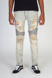 RIPPED MOTO JEANS WITH MULTI-PAINT SPLATTER