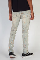 RIPPED MOTO JEANS WITH MULTI-PAINT SPLATTER